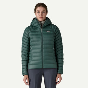 Front on-model view of women's green Patagonia down sweater hoody