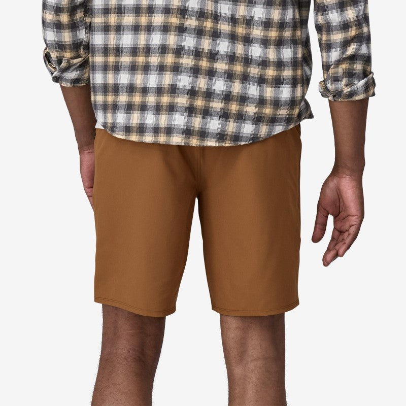 Back on-model view of men's Patagonia Hydropeak Hybrid Walk Shorts in tree ring brown