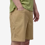 Side on-model view of men's Patagonia Quandary 8" Shorts in classic tan