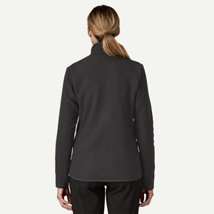 Back on-model view of women's black Patagonia R1 Air fleece jacket