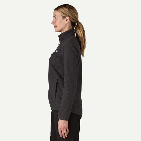 Side on-model view of women's black Patagonia R1 Air fleece jacket