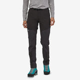 Front of model wearing patagonia women's terravia alpine pants in black