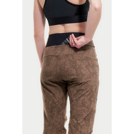 Back pocket detail view of women's brown Peppermint Cycling pants
