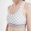 Checkered sports bra with 'Peppermint' branding