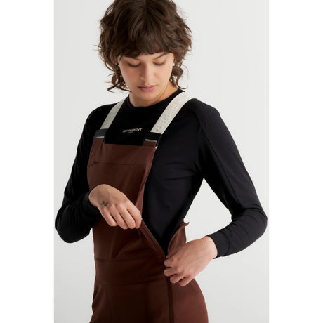 Side zip detail of Peppermint Cycling Co. bike overalls in espresso