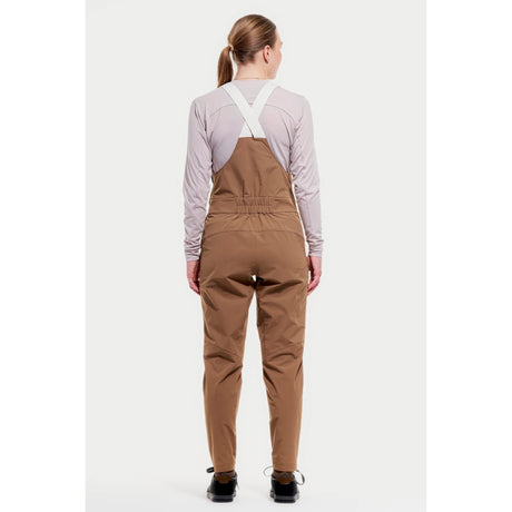 Back on-model view of women's brown Peppermint Cycling overalls