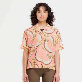 Front on-model view of women's banana/grapefruit print Peppermint Cycling shirt