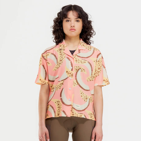 Front on-model view of women's banana/grapefruit print Peppermint Cycling shirt