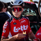 Athlete eating a Precision Fuel 60 chew bar