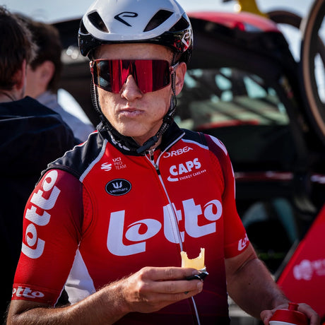 Athlete eating a Precision Fuel 60 chew bar