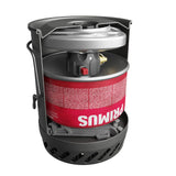 Cutaway view of a Primus portable camping stove system with fuel and stove packed inside pot