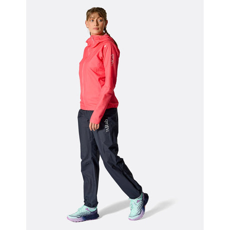 Women wearing black Rab Phantom waterproof pants