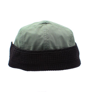 Back view of green Rabbit running Defroster Trapper Hat
