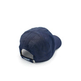 Back view of rabbit running Elite Hat in white