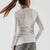 Back view of women's white rabbit EZ tee perf ice long sleeve shirt