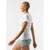 Side view of women's white rabbit running EZ Tee Perf Ice t-shirt