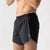 Side view of men's rabbit Fuel n' Fly shorts in black