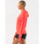 Side view of women's rabbit UPF Deflector 2.0 pullover in fiery coral