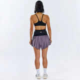 Back on-model view of black Raide running belt