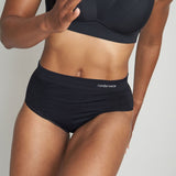 Model wearing women's black runderwear running brief