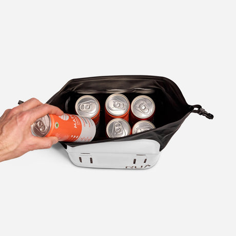 6 cans fitting into a white RUX cooler cube
