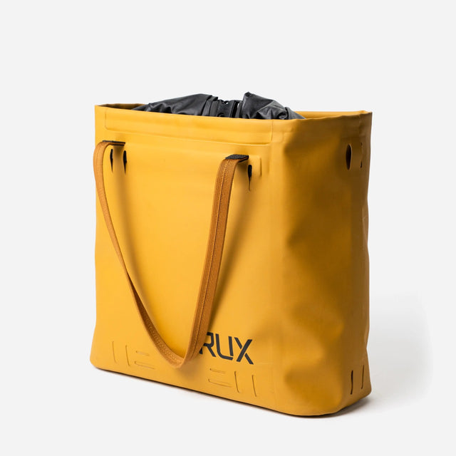 Yellow RUX waterproof 15L tote bag, side view