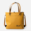 Yellow RUX waterproof 15L tote bag, straps up