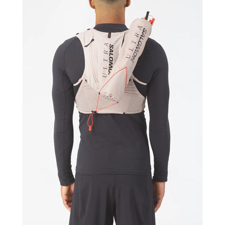 Back on-model view of Salomon pole quiver attached to a Salomon running vest