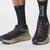 Model wearing salomon s/lab ultra trail running shoes