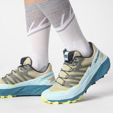 On-model view of women's salomon thundercross trail running shoe in alfalfa/tanager turquoise/sunny lime colour