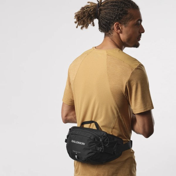 On-model view of salomon trailblazer belt pack in black