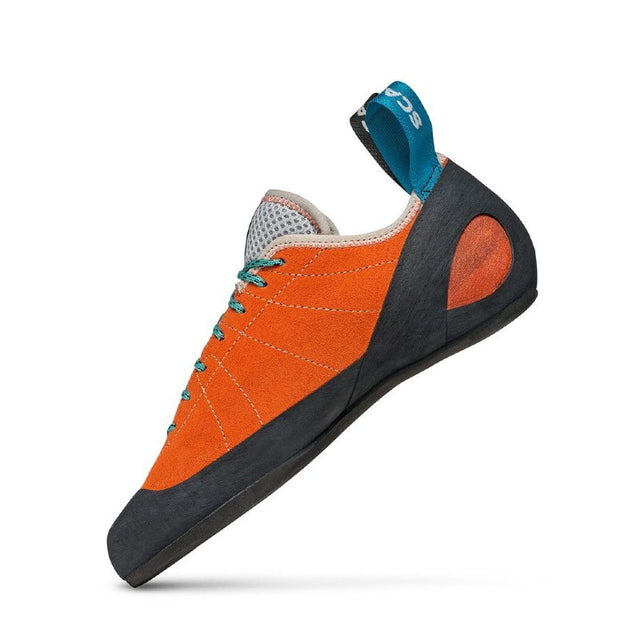 Inner side view of women's mandarin red Scarpa Helix climbing shoe