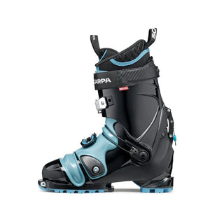 Inner side view of women's black/blue Scarpa TX Pro telemark boot