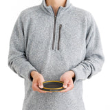 Model holding Sea to Summit Frontier Ultralight collapsible bowl