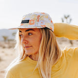 On-model side view of skida brim hat in superstar print