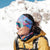 Skier wearing a skida headband in daydream rpint