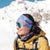 Skier wearing a skida headband in daydream print