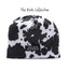 Kids' Skida Alpine hat in moo cow pattern