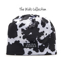 Kids' Skida Alpine hat in moo cow pattern