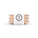 3-pack view of Teleties hair ties in millenial pink colour