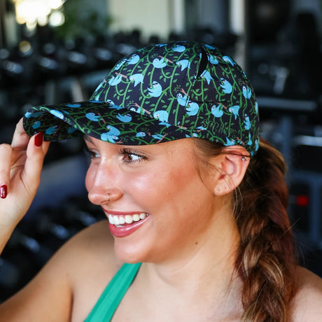 Woman wearing a Sprints OG hat with sloths pattern