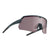 Angled view of tripoint 001 Treriksroset sunglasses, black frame and pink silver lens