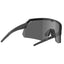 Angled view of tripoint 001 Treriksroset sunglasses, black frame and smoke lens