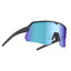Angled view of tripoint 001 Treriksroset sunglasses, black frame and blue lens