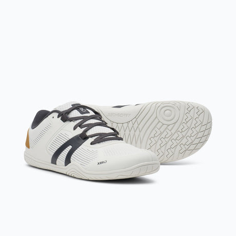 Pair of women's white Xero Shoes 360 Rally court shoes