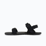 Inner side view of women's black Xero Shoes D-Trail minimalist sandal