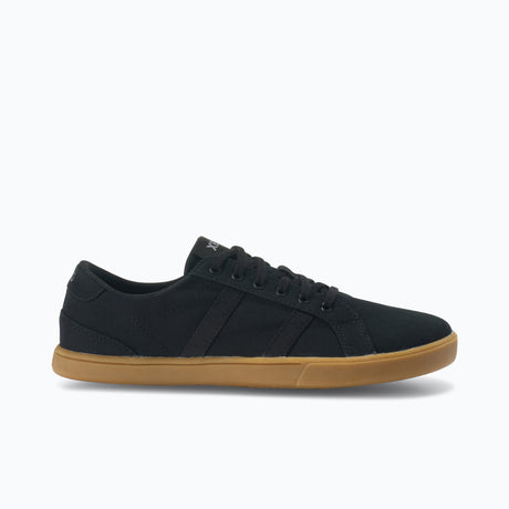 Side view of women's black/gum Xero Shoes Dillon canvas sneaker