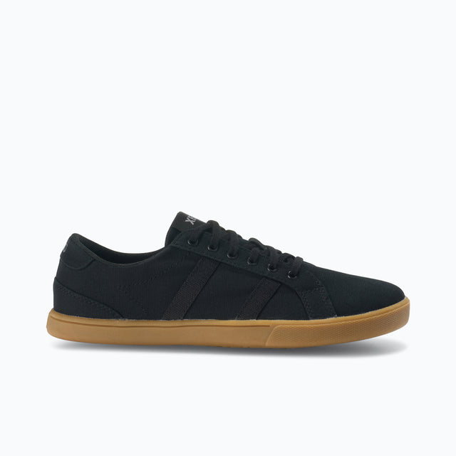 Side view of women's black/gum Xero Shoes Dillon canvas sneaker