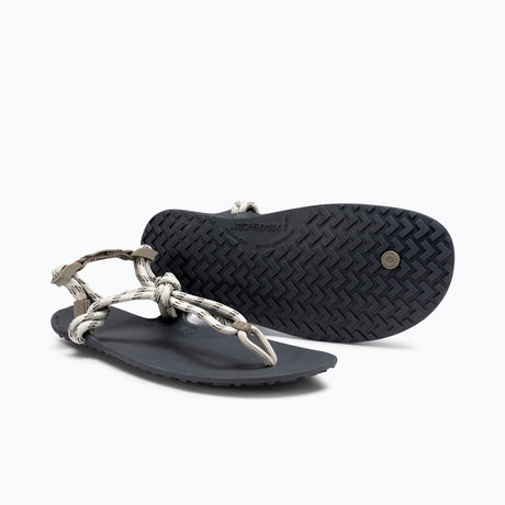 Pair of women's stone coloured Xero Shoes Genesis minimalist sandals