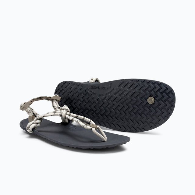 Pair of women's stone coloured Xero Shoes Genesis minimalist sandals